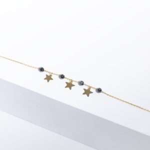 18K YELLOW GOLD STAR BRACELET WITH HEMATITE STONE