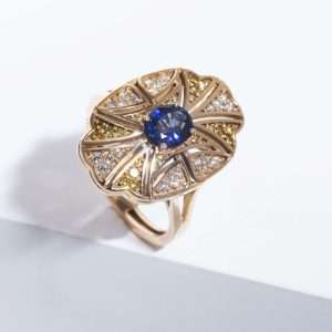 18K YELLOW GOLD RING WITH WHITE DIAMOND AND SAPPHIRE