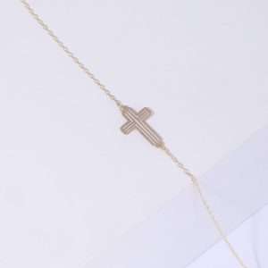 18K YELLOW GOLD CROSS BRACELET