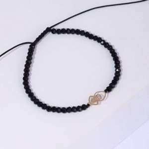 18K YELLOW GOLD SAINT CHARBEL BRACELET WITH ONYX ON CORDON