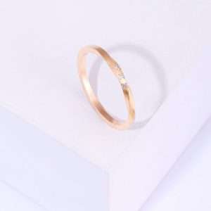 18K PINK GOLD HANDCRAFTED TWISTED RING WITH WHITE DIAMOND