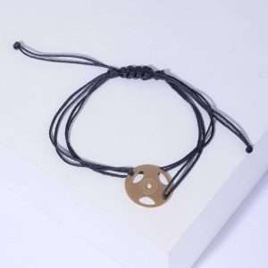 18K YELLOW GOLD WHEEL BRACELET ON CORDON