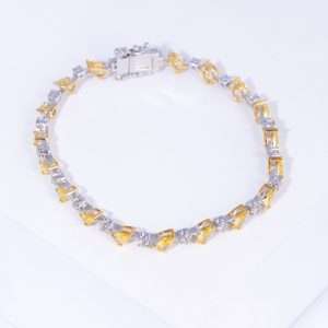 18K WHITE GOLD BRACELET WITH WHITE DIAMOND AND YELLOW GARNET STONE