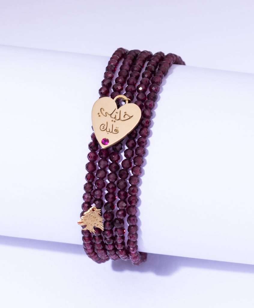18K YELLOW GOLD EHDEN BRACELET WITH HEART SHAPE KHALILE ALBAK, RUBY AND GARNET STONE