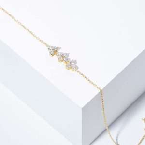 18K YELLOW GOLD TRINITY BRACELET WITH WHITE DIAMOND