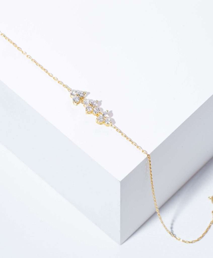 18K YELLOW GOLD TRINITY BRACELET WITH WHITE DIAMOND