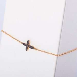 18K PINK GOLD CROSS BRACELET WITH BLACK DIAMOND