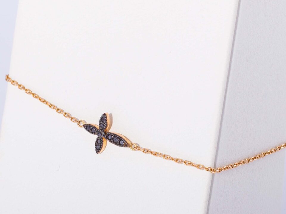 18K PINK GOLD CROSS BRACELET WITH BLACK DIAMOND