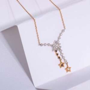 18K PINK GOLD STAR NECKLACE WITH BLACK AND WHITE DIAMOND