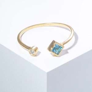 18K YELLOW GOLD OPEN RING WITH BLUE STONE AND WHITE DIAMOND