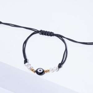 CORDON BRACELET WITH GOLD BEADS, PEARL AND EYE