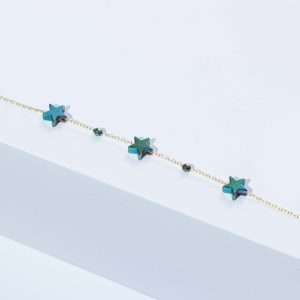 18K YELLOW GOLD BRACELET WITH COLORED HEMATIT STAR