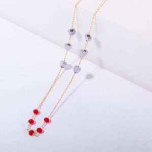 18K YELLOW GOLD NECKLACE WITH RED STONE AND HEMATITE HEARTS