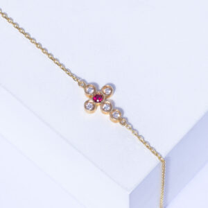 18K YELLOW GOLD CROSS BRACELET WITH WHITE DIAMOND