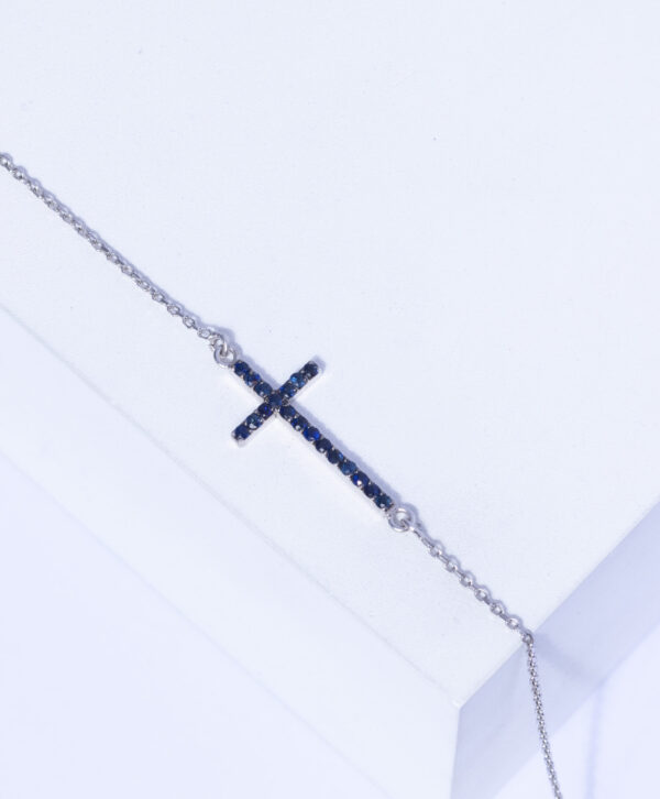 18K WHITE GOLD CROSS BRACELET WITH BLUE SAPPHIRE