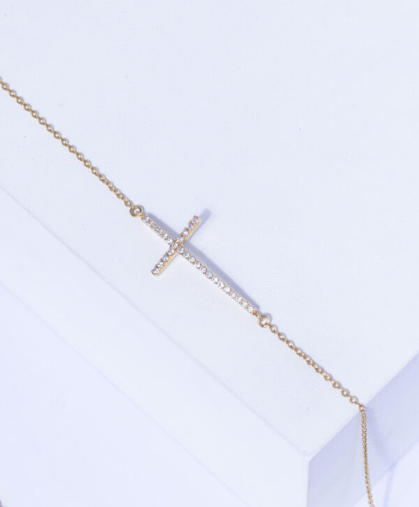 18K YELLOW GOLD CROSS BRACELET WITH WHITE DIAMOND