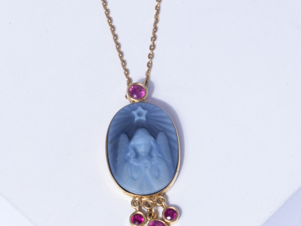 18 YELLOW GOLD ANGEL NECKLACE WITH RUBY