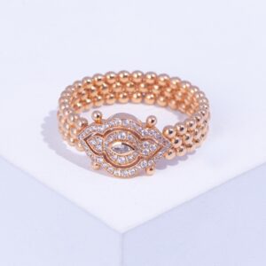 18K PINK GOLD EYE RING WITH WHITE DIAMOND