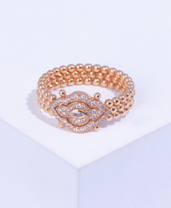 18K PINK GOLD EYE RING WITH WHITE DIAMOND